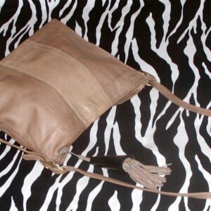 Vintage Shoulder Bag With A Horn And Leather Tassel