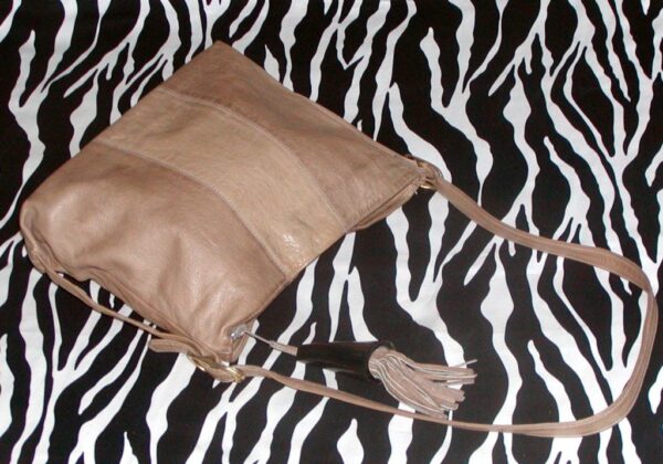 Vintage Shoulder Bag With A Horn And Leather Tassel