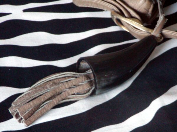 Vintage Shoulder Bag With A Horn And Leather Tassel