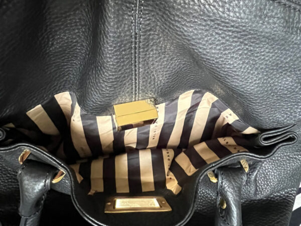 Black Leather Kelsi Dagger Handbag With Gold Hardware